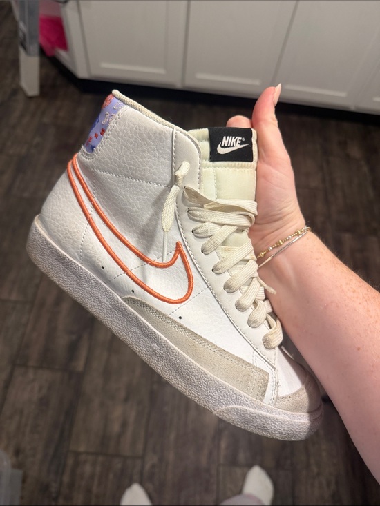 Nike Shoes - Nike Women’s High-Top Sneakers in White with Orange Swoosh